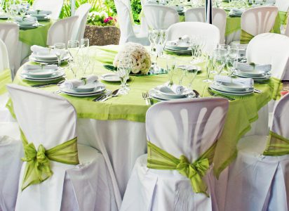 gorgeous wedding chairs and table setting for fine dining at outdoors